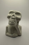 Calavera pensante blanca